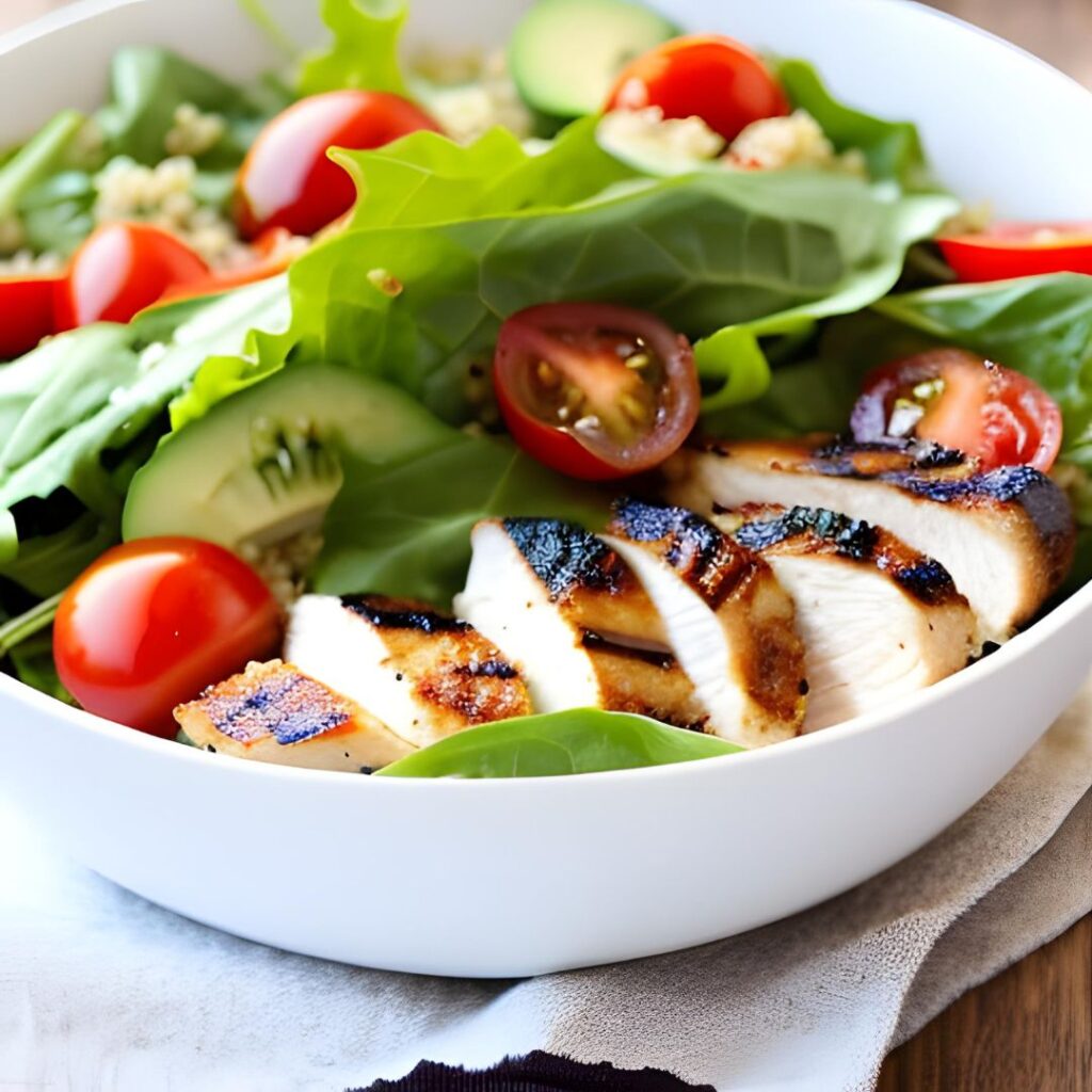 Quinoa and Grilled Chicken Salad with mixed greens, tomatoes, and balsamic Vinaigrette. 
