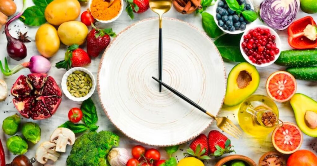 table with having a clock and healthy foods items 