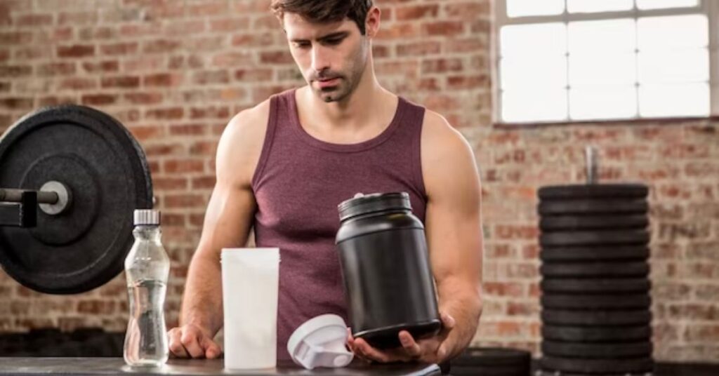 a gym enthusiast making pre-workout drink