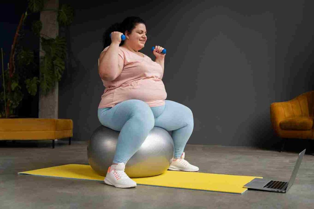 an obese lady sitting on a bin bag doing exercise