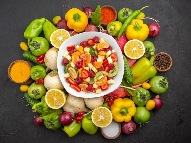 a plate full of healthy fruits and vegetables 