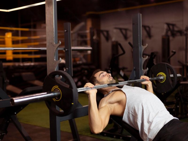 a person doing incline bench press